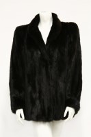 Lot 640 - A dark brown mid-length mink fur coat