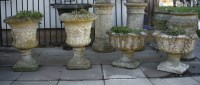 Lot 899 - A pair of reconstituted stone campana garden urns