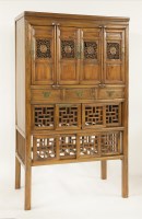 Lot 851 - An early 20th century Chinese cupboard
