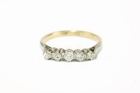 Lot 273 - A gold graduated five stone diamond ring