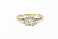 Lot 209 - A gold single stone illusion set diamond ring