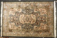 Lot 768A - A Kirman silk ground rug