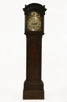Lot 890 - An oak longcase clock