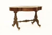 Lot 892 - A Victorian figured walnut stretcher table
