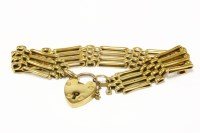 Lot 295 - An Edwardian four row gate link bracelet with padlock