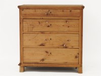 Lot 770 - A Continental pine chest of four graduated drawers