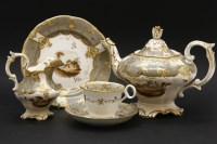 Lot 534 - A 19th century Rockingham tea service
