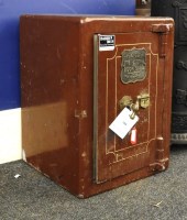Lot 786 - A small iron safe with key