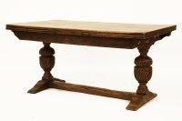 Lot 815 - A Jacobean Revival oak drawleaf table