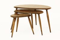 Lot 888 - An Ercol pebble design elm nest of tables