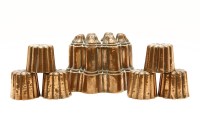 Lot 367 - A copper jelly mould and six smaller ones