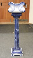Lot 645 - An Art Nouveau blue glazed large jardinière on stand