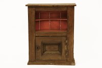 Lot 825 - An early 18th century and later oak cupboard