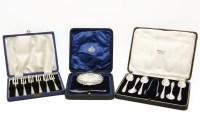 Lot 343 - A cased silver butter dish and knife