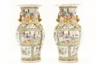 Lot 604 - A pair of late 19th century Canton famille rose vases