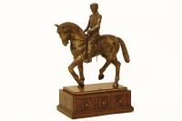 Lot 631 - A reproduction bronzed figure of a uniformed man on horseback