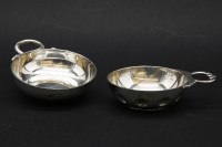 Lot 344 - Two silver tastevin’s