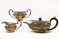 Lot 388 - An Edwardian hallmarked silver three piece teaset