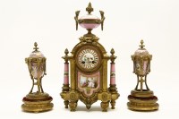 Lot 630 - A French gilt metal clock