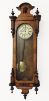 Lot 618 - A late 19th century walnut Vienna regulator