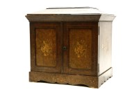 Lot 609 - A Victorian inlaid figured walnut table cabinet
