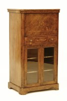 Lot 781 - A late Victorian walnut and box wood strung escritoire music cabinet