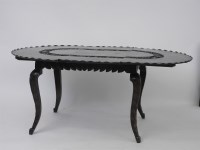 Lot 823 - An Anglo-Indian dining table
