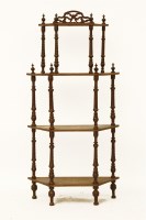 Lot 775 - A late 19th century inlaid mahogany four tier whatnot
