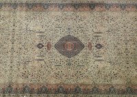 Lot 880 - A large pale green ground Persian style carpet