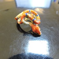Lot 311 - A gold and enamel serpent or snake ring