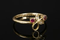 Lot 718 - A ruby and diamond spray ring