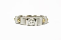 Lot 6 - A two colour gold single stone diamond ring