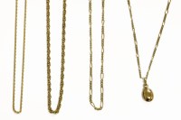 Lot 67 - Five assorted gold charms and pendant