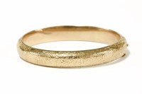 Lot 46 - A 9ct gold hinge bangle
