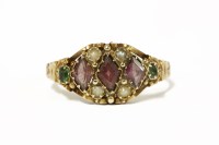 Lot 12 - An 18ct gold three stone lozenge shaped amethyst