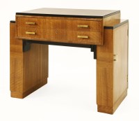 Lot 70 - An Art Deco walnut and ebonised canteen table