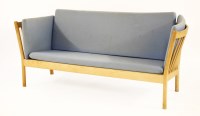 Lot 322 - A Danish beech stick back settee
