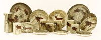 Lot 179 - A French pottery twelve-piece tea set