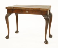 Lot 607 - A George II walnut concertina action fold-over card table