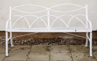 Lot 611 - A wrought iron garden bench