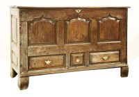 Lot 539 - An oak mule chest