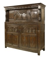 Lot 545 - An oak press cupboard