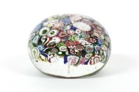 Lot 121 - A millefiori glass paperweight