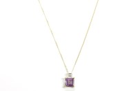 Lot 52 - An amethyst and diamond pendant