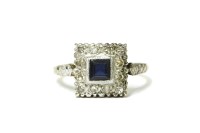 Lot 20 - An 18ct gold square cut sapphire and diamond cluster ring