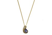 Lot 7 - A 9ct gold pear shaped tanzanite and brilliant cut diamond pendant
