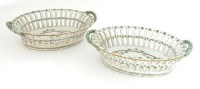 Lot 149 - A pair of tin-glazed earthenware chestnut baskets