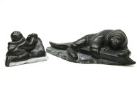 Lot 300 - An Eskimo stone figure with kayak