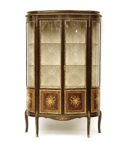 Lot 406 - A Louis XVI design inlaid vitrine fitted pair of shaped