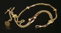 Lot 518 - A late Victorian gold three row albertine